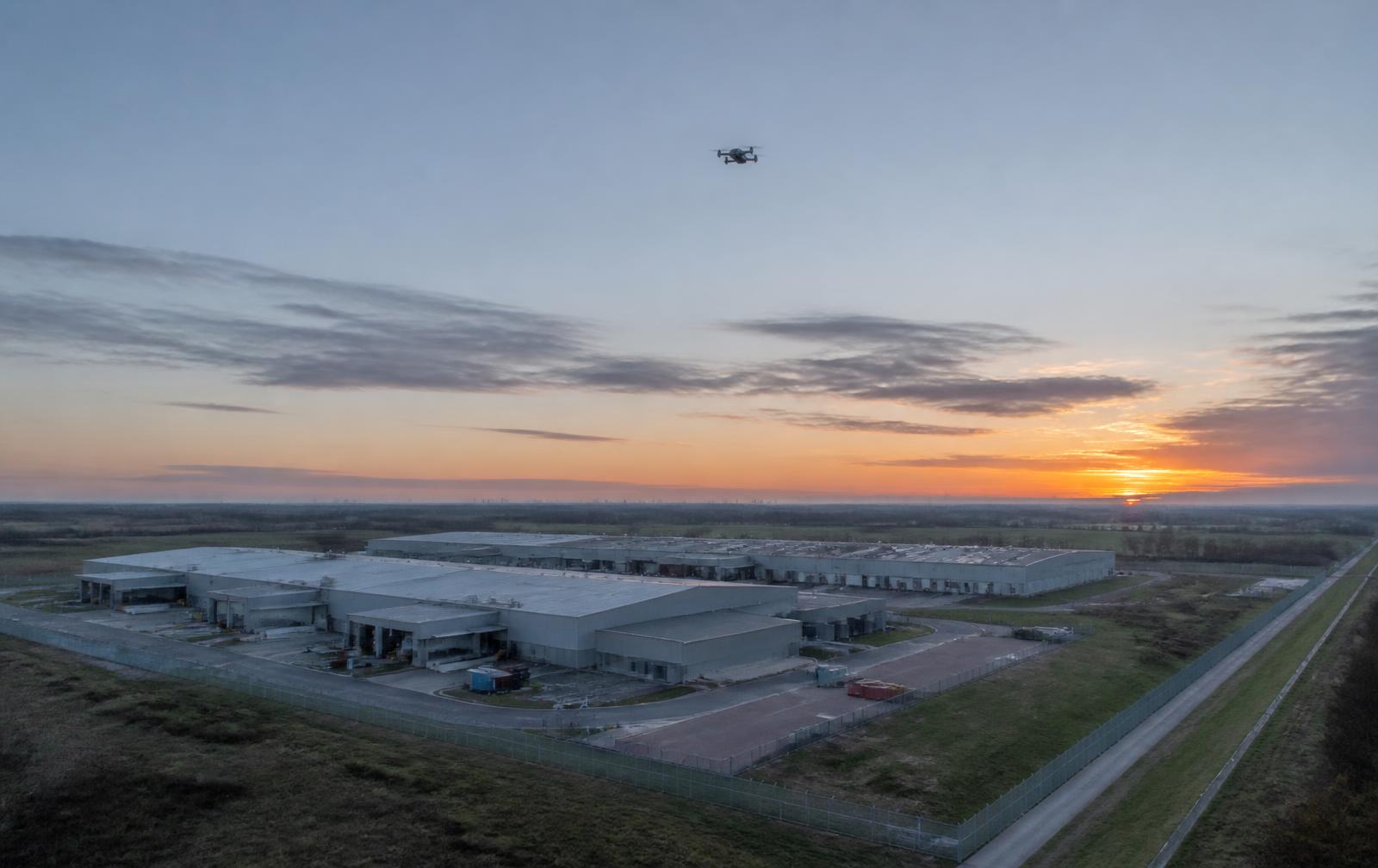 Security drone above an industrial facility
